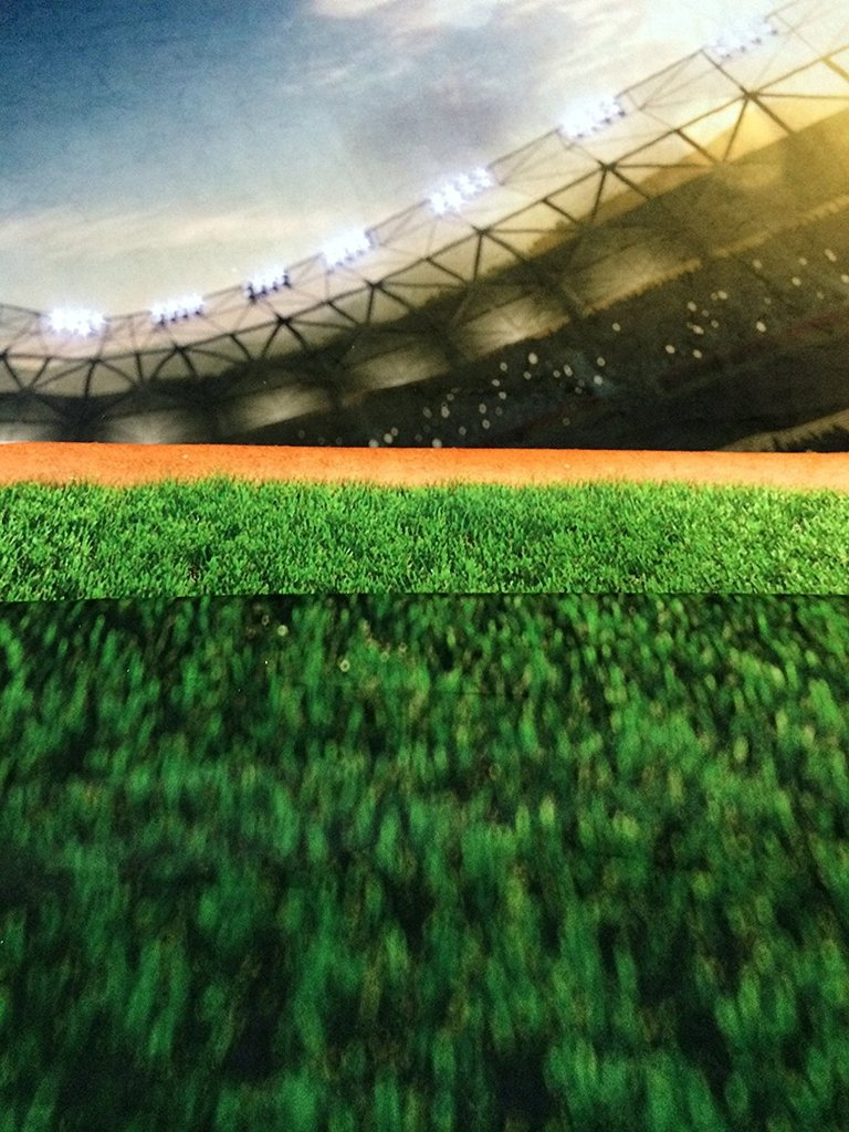 Toile de fond d'herbe verte sports terrain de football sous le soleil fond de photographie