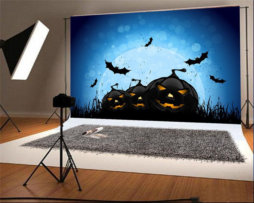 Toile de fond d'Halloween de chauves-souris citrouilles noires
