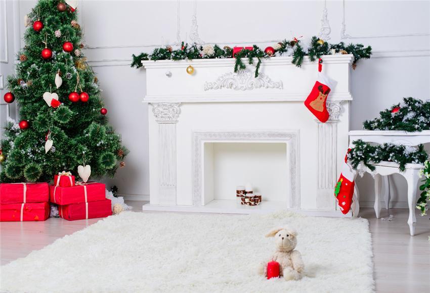 Toile de fond décors de cheminée blanche de sapin de Noël