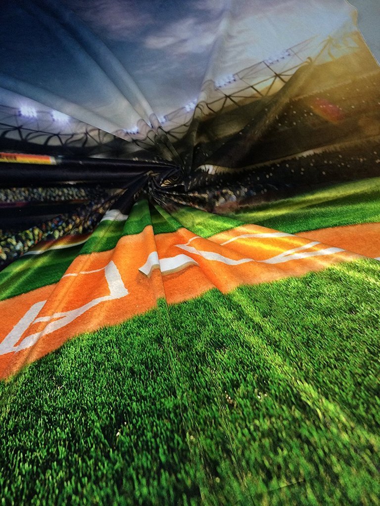 Toile de fond d'herbe verte sports terrain de football sous le soleil fond de photographie