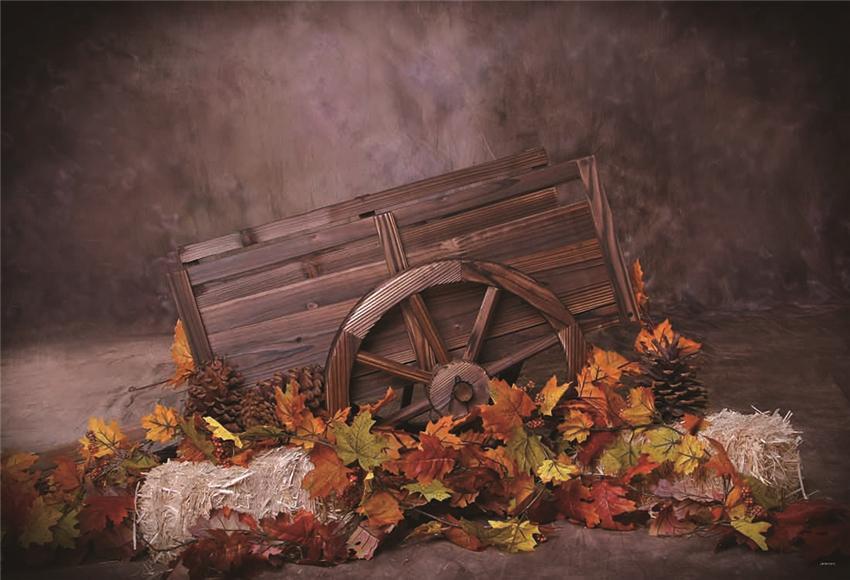 Toile de fond de feuilles d'automne brunes chariot en bois décors de botte de foin