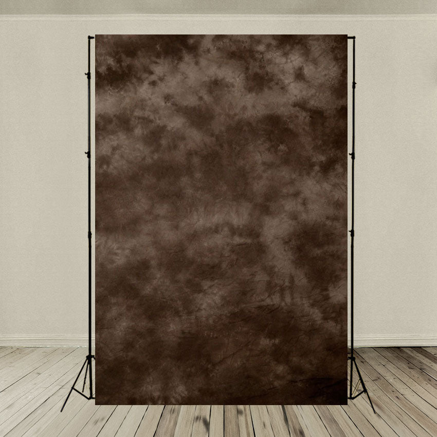 Toile de fond abstraitee de photographie marbrée brun foncé pour le studio