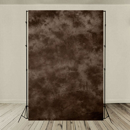 Toile de fond abstraitee de photographie marbrée brun foncé pour le studio