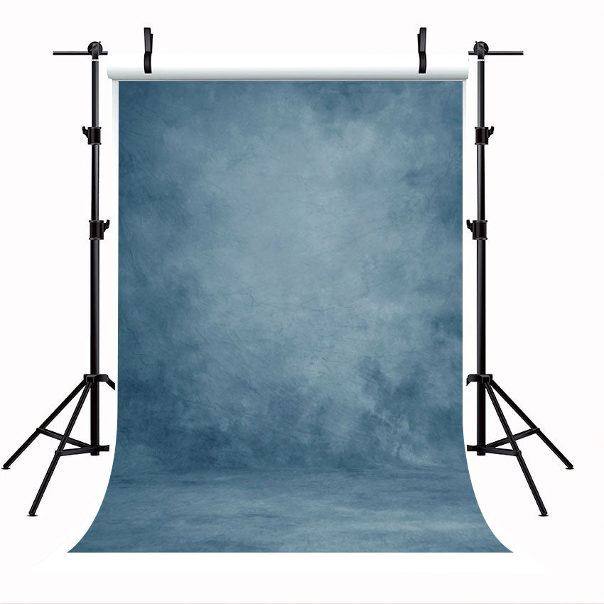 Toile de fond abstraitee bleu fumé pour portrait photographique