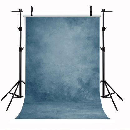 Toile de fond abstraitee bleu fumé pour portrait photographique