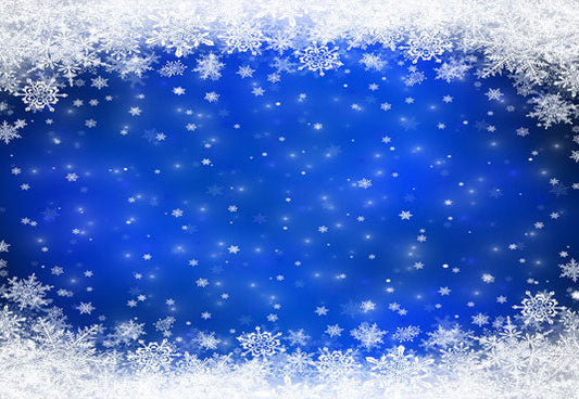 Toile de fond de flocon de neige blanc sur fond bleu de photographie de Noël