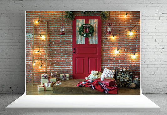 Toile de fond de porte rouge de Noël en brique rouge pour la photographie