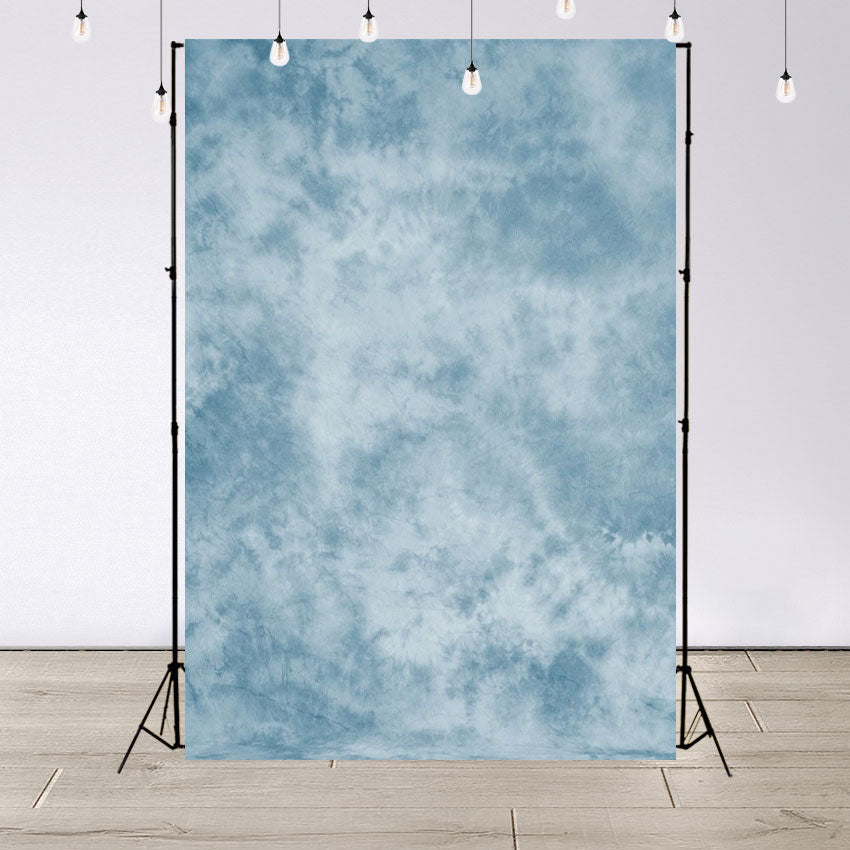 Toile de fond abstraitee de photomaton tachetés de blanc et de bleu pour la photographie