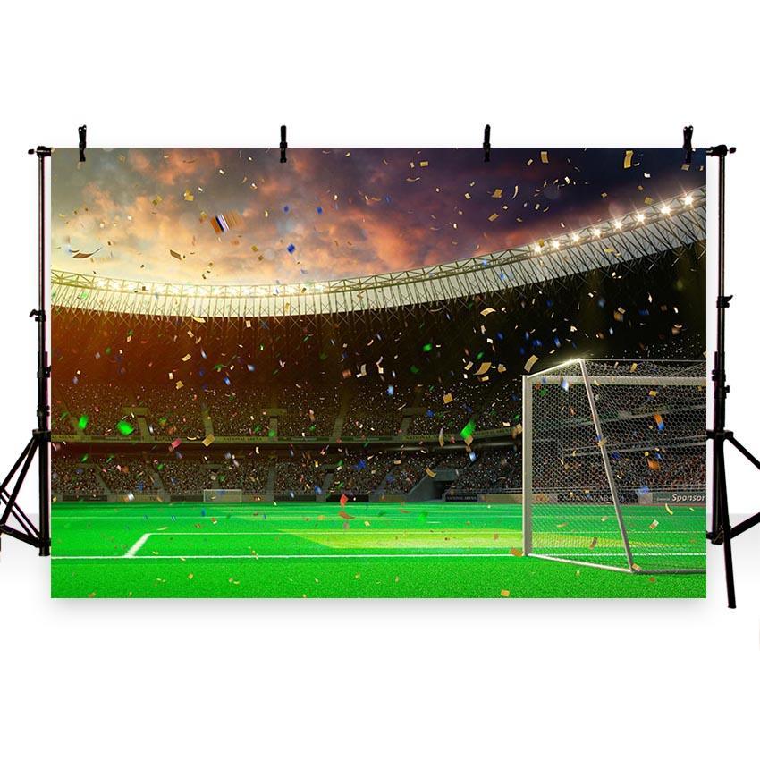 Toile de fond de coucher de soleil fond d'herbe verte fond de photographie de terrain de football