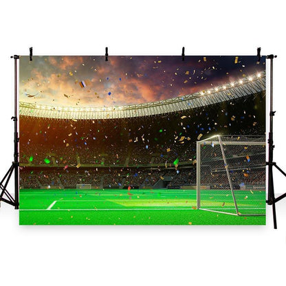 Toile de fond de coucher de soleil fond d'herbe verte fond de photographie de terrain de football