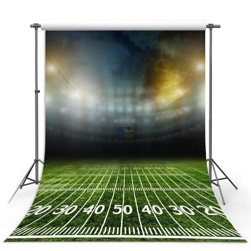 Toile de fond d'herbe verte fond de photographie de terrain de sport de nuit