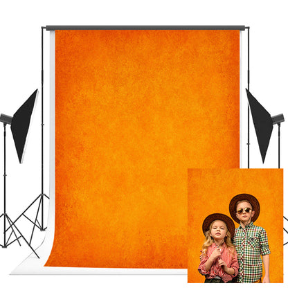 Toile de fond abstraitee de photographie orange couleur unie pour la prise de vue photo