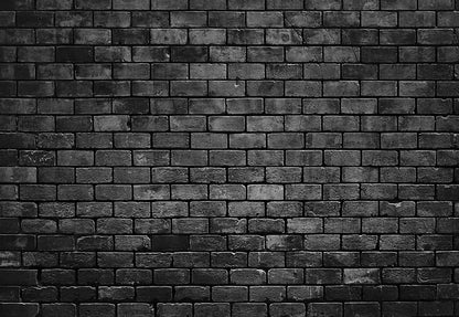 Toile de fond décors de mur de briques noires de photographie
