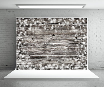 Toile de fond de photographie de mur en bois gris clair de flocon de neige de Noël