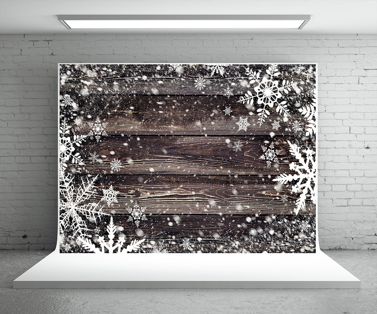 Toile de fond de flocon de neige mur en bois foncé photographie de Noël